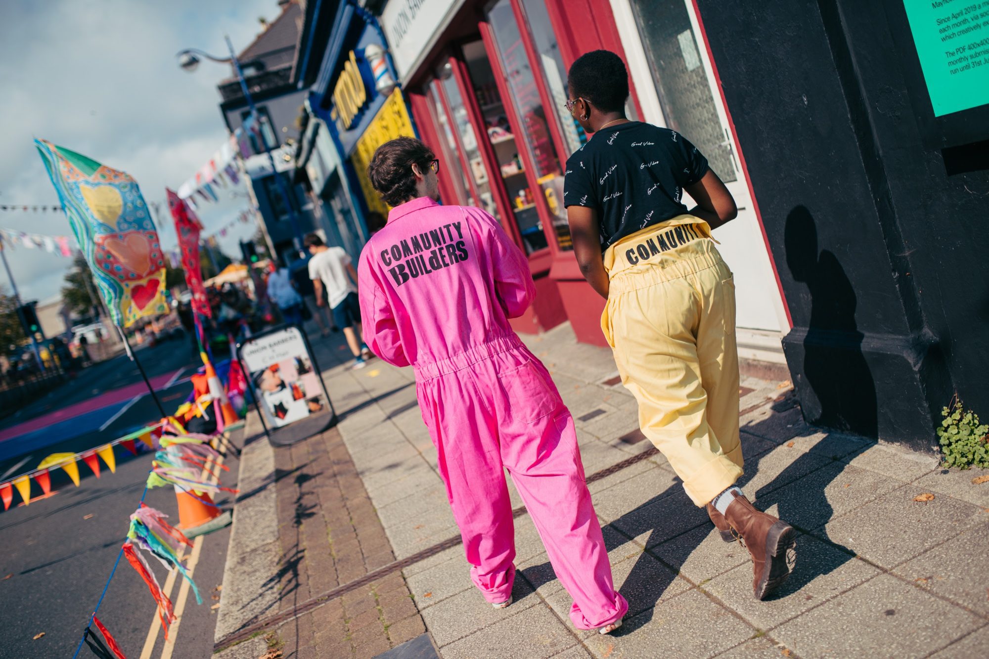 Fordhall_Farm_ChrisBethell (84) 2 people wearing Community Builders jumpsuits
