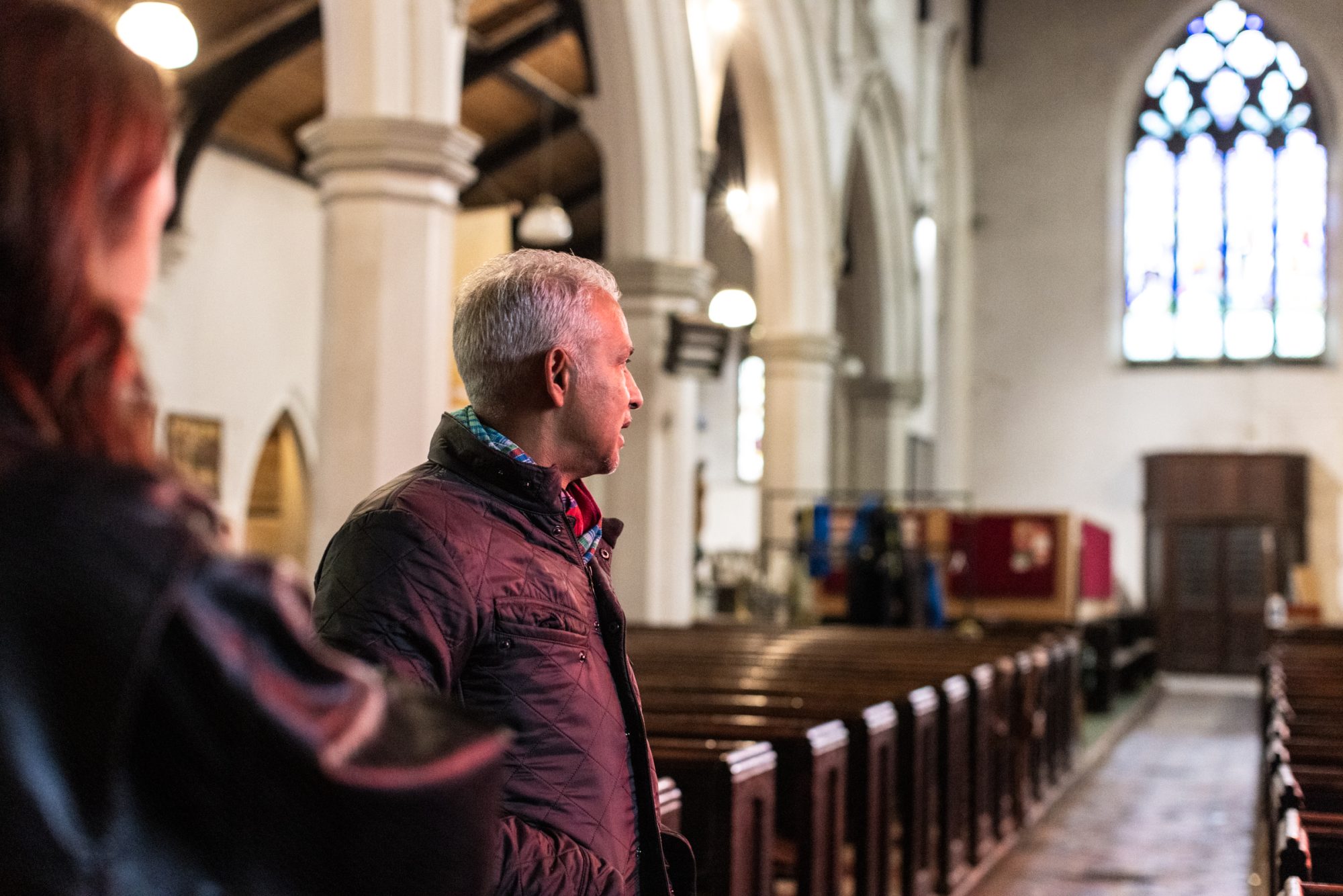 Chris Bethell_powertochange_birmingham_lowres-29 person facing away inside a large church